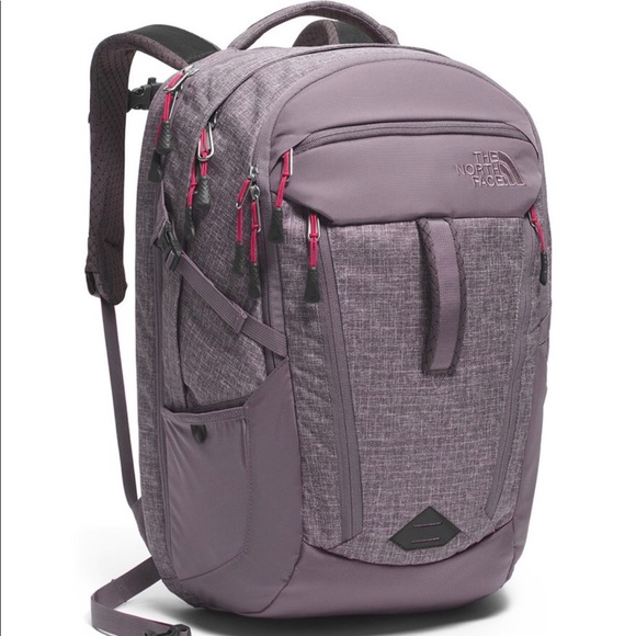 grey and purple north face backpack